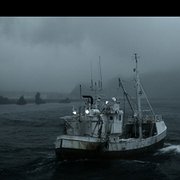 En fiskebåt som går under.