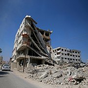 En förstörd byggnad i Zamalka i östra Ghouta efter bombardemang av regeringsstyrkor (april 2013). En förstörd byggnad i Zamalka i östra Ghouta efter bombardemang av regeringsstyrkor (april 2013).