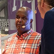 Esayas Isaak pekar på hur svensk-eritreanerna är splittrade i synen på regimen.