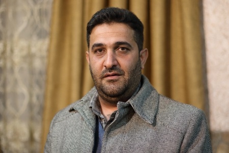 Amanj Hassan arresterades i december och säger att han blev torterad i källaren under en Asayishbyggnad. Han sover inte hemma sedan dess.