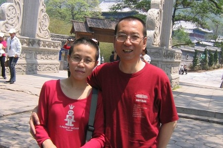 Paret Liu Xia och Liu Xiaobo. Liu Xiaobo är dömd till fängelse medan Liu Xia sitter i husarrest utan domstolsbeslut.