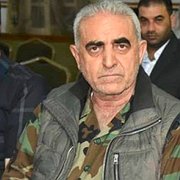 Jamal Hassan, chef för det syriska flygvapnets underrättelsetjänst, anklagas för brott.