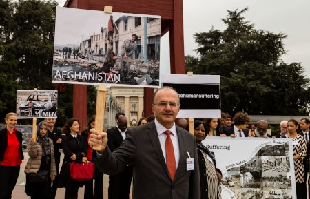 En protest i Genève år 2017 för att kräva att vapenhandelsavtalet ATT respekteras.