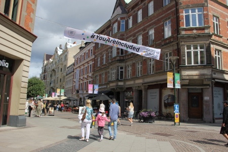 Taglinen för årets World Pride, #youareincluded, är utspridd i Malmö.