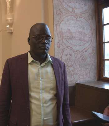 EStephen Gatlueng Kouh har kommit till Stockholm för att vittna och vidhåller att det var företrädare för Lundin Oil som försökte tysta honom.
